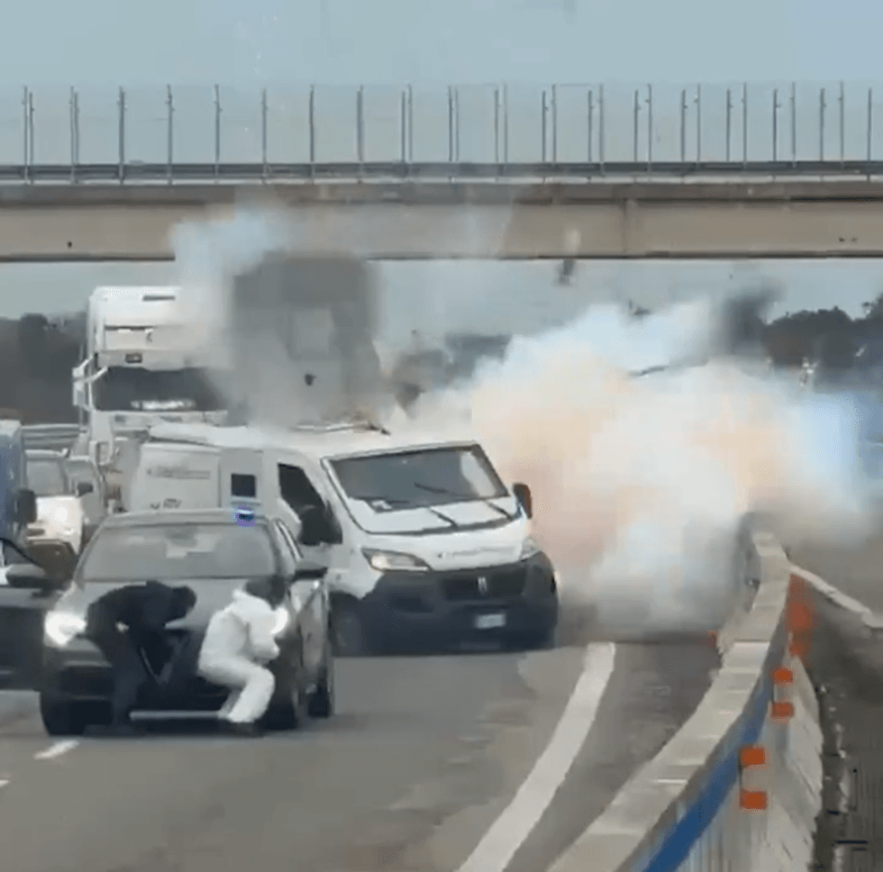 armed gang blows up van