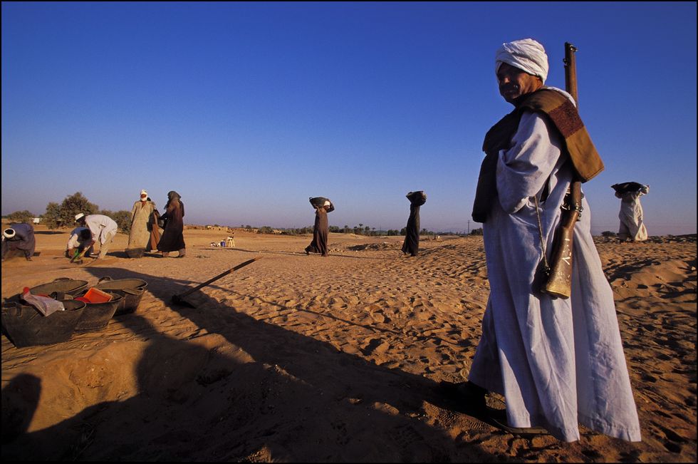 Armed locals oversee the Adaima dig site\u200b
