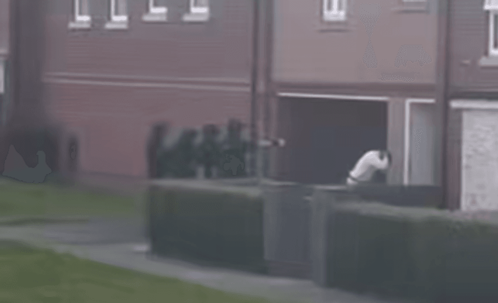 Armed police arresting the man suspected of carrying a bladed article