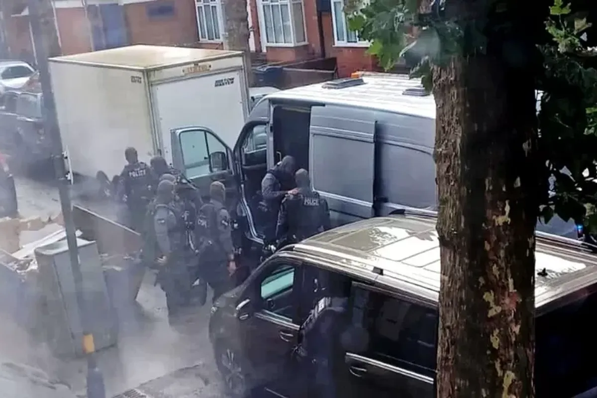 Armed Police on site after man barricades himself inside house