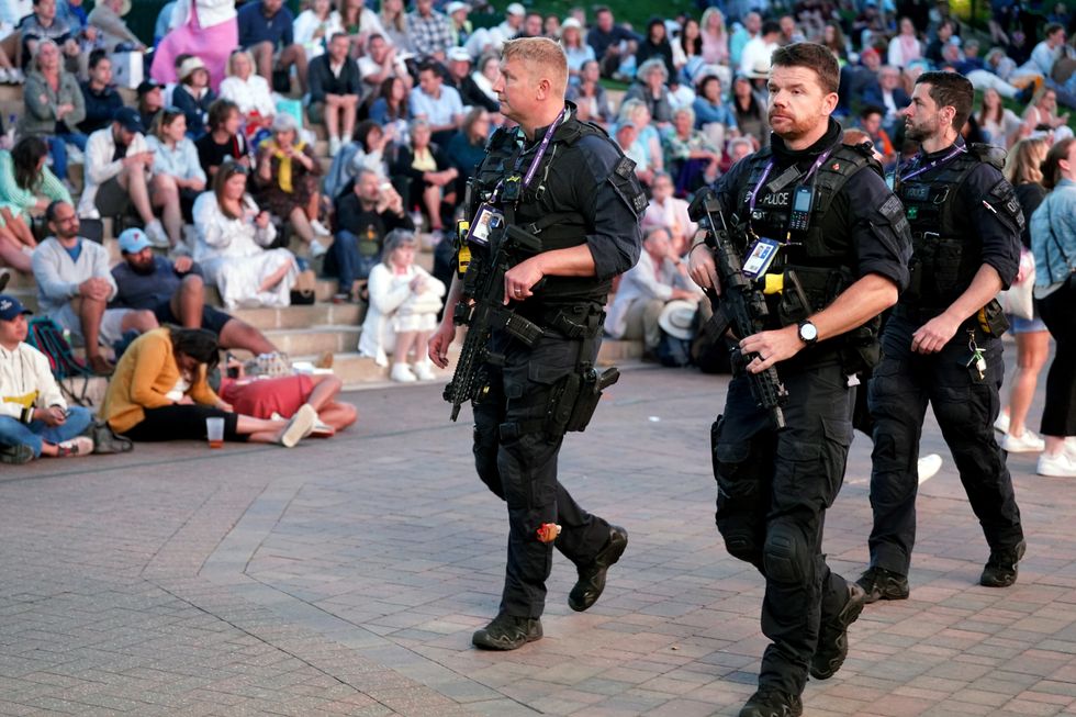 Armed Police patrol Wimbledon in July