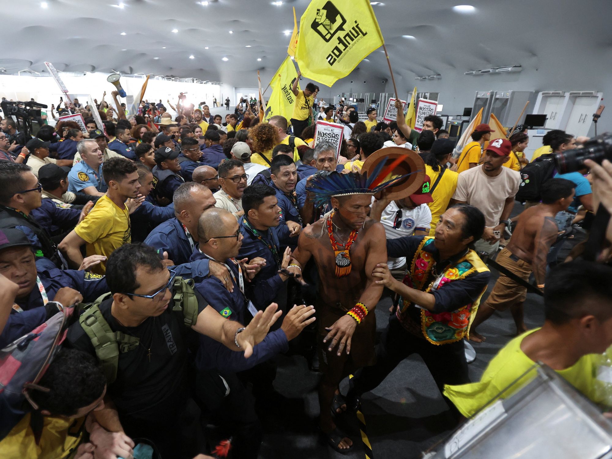 Armed protesters storm Cop30 as clashes erupt at climate conference