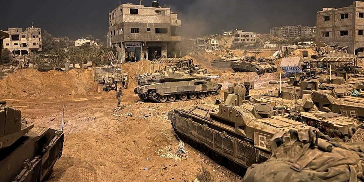 NextImg:Israel 'surrounds Gaza City' and hails 'HUNDREDS of terrorists are dead'