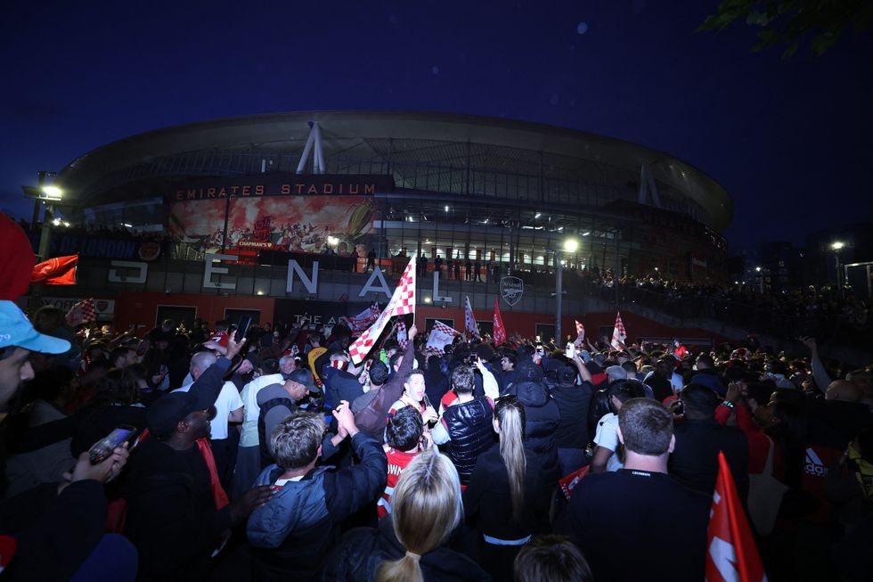 Arsenal fans celebrated outside the Emirates after winning the Premier League title