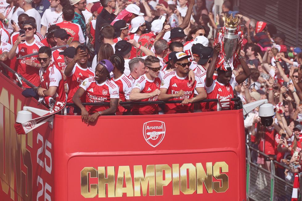 Arsenal players have returned to London to celebrate their Premier League title win