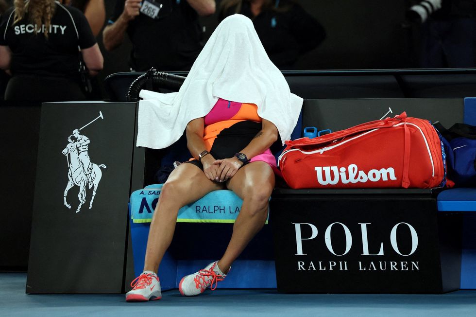 Aryna Sabalenka put a towel over her head after suffering defeat in the Australian Open final