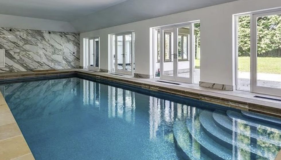 As well as a gym and private cinema, the mansion also includes an indoor pool
