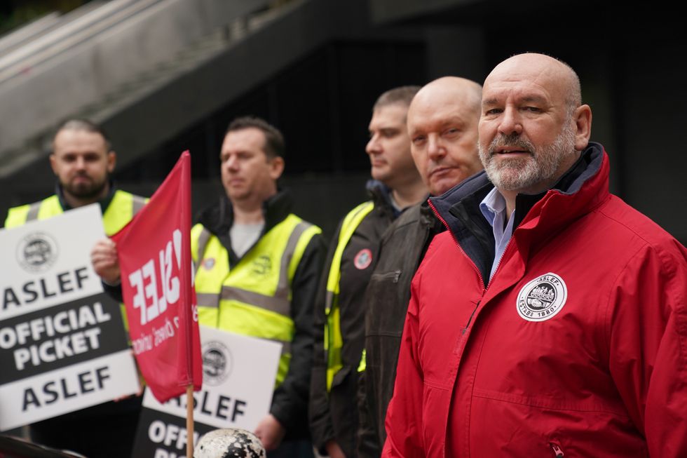 Aslef General Secretary Mick Whelan (right) at a picket line at Euston station in London, as members of the drivers' union Aslef and the Transport Salaried Staffs Association (TSSA) go on strike. Picture date: Wednesday October 5, 2022.