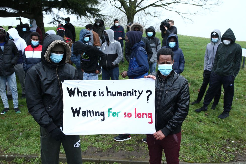 Asylum seekers protest outside the Crowne Plaza London Heathrow hotel in West Drayton in 2021