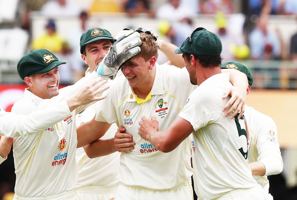Australia's Cameron Green celebrates the wicket of England's Ollie Pope during day one of the first Ashes test at The Gabba, Brisbane.