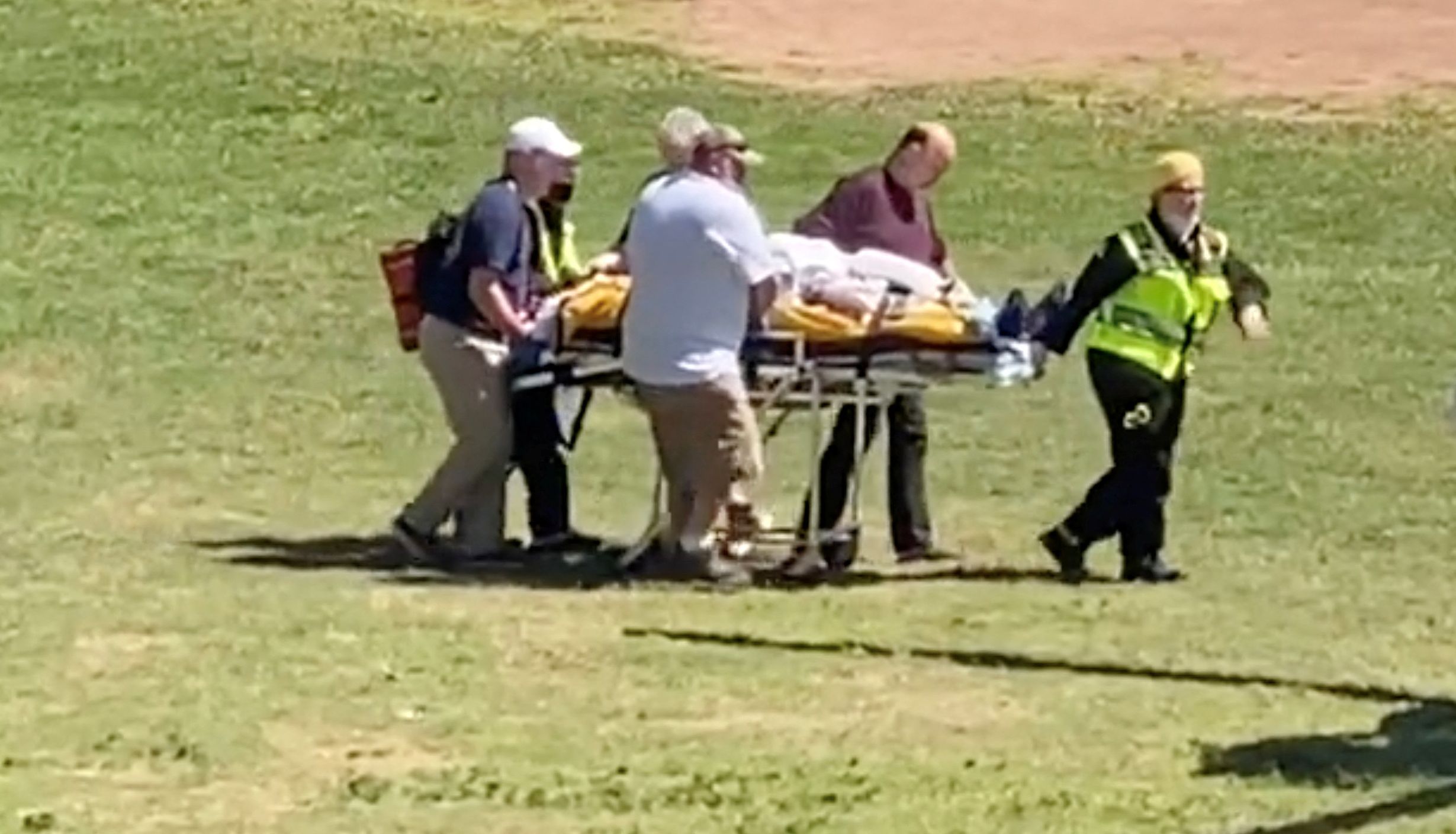 Author Salman Rushdie is transported to a helicopter after he was stabbed on stage before his scheduled speech at the Chautauqua Institution, Chautauqua, New York, U.S., August 12, 2022