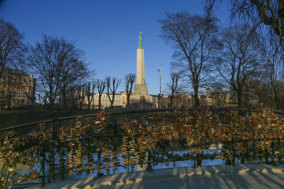 Authorities in Riga have fenced off Latvia\u2019s most revered landmark, the Freedom Monument, amid fears that visiting England football fans could desecrate it ahead of Tuesday\u2019s World Cup qualifier