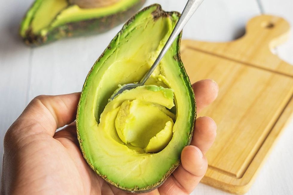 AVOCADO IN HAND