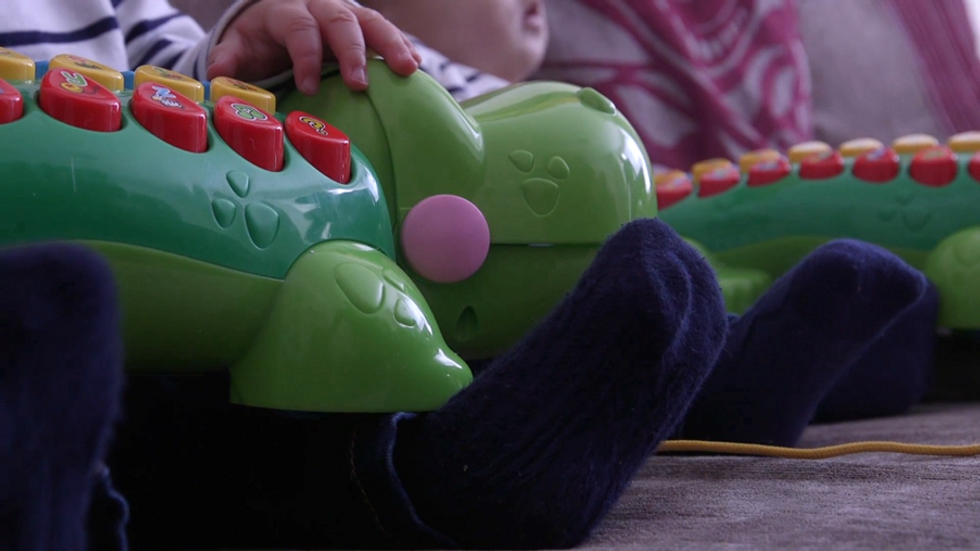 Baby with toy