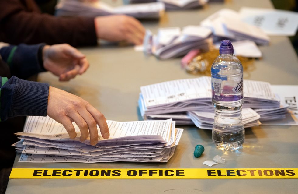 Ballot papers are sorted and verified at Erdington Academy during the count for the Erdington by-election. Picture date: Thursday March 3, 2022.