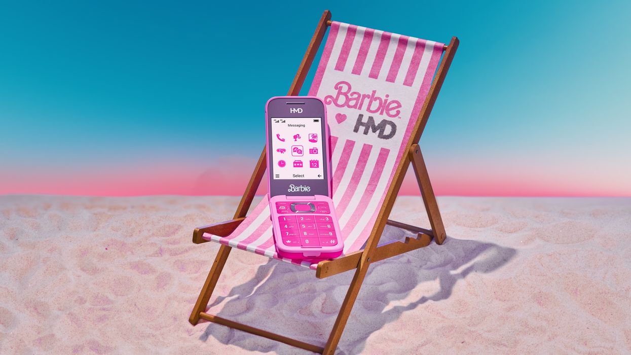 barbie phone pictured reclined on a beach chair