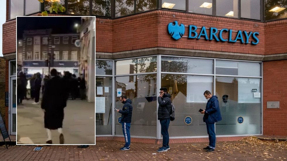 Barclays branch and people in crowd outside ATM machine