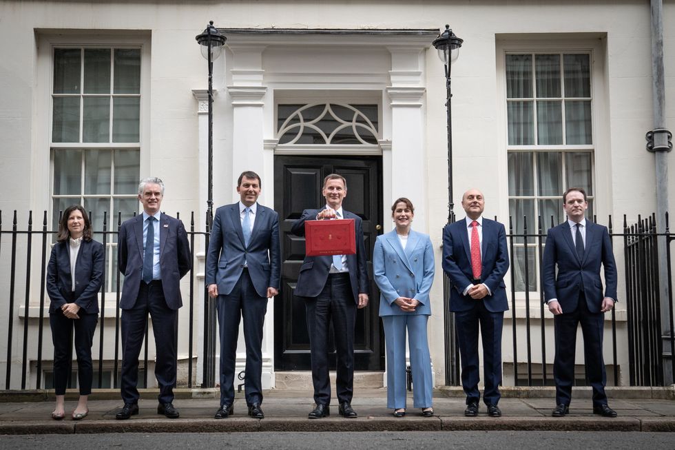 Baroness Joanna Penn, James Cartlidge, John Glen, Chancellor Jeremy Hunt, Victoria Atkins, Andrew Griffith and Gareth Davies outside Downing Street