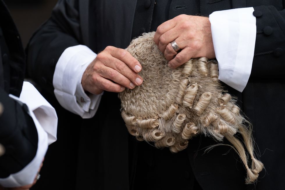 Barristers are voting on whether to end strike action after a pay offer from the Government.