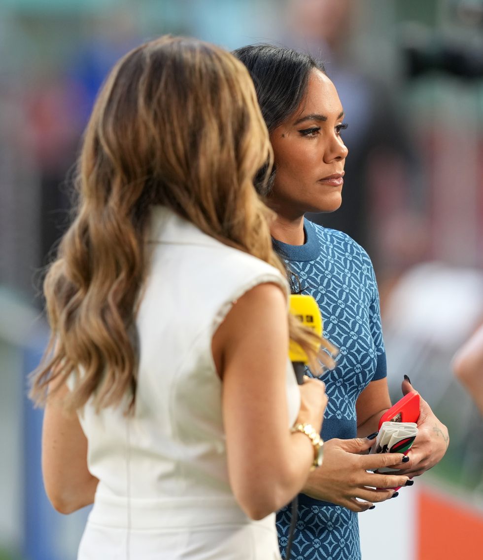 BBC presenter Alex Scott (right) holding the OneLove armband before the FIFA World Cup Group B match at the Khalifa International Stadium in Doha, Qatar. Picture date: Monday November 21, 2022.