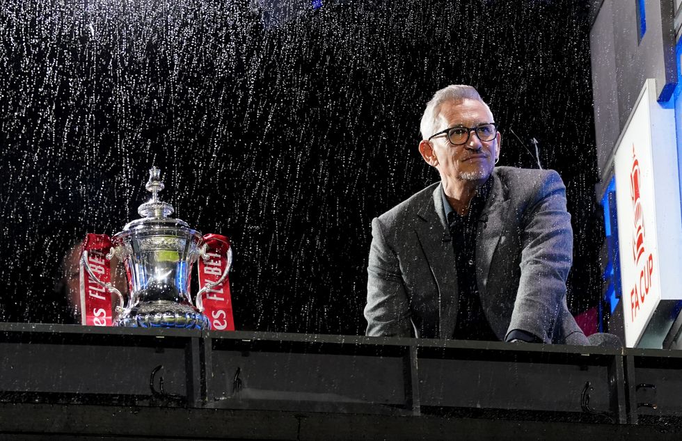 BBC presenter Gary Lineker with the FA Cup during the Emirates FA Cup third round match at the Hillsborough Stadium, Sheffield. Picture date: Saturday January 7, 2023.
