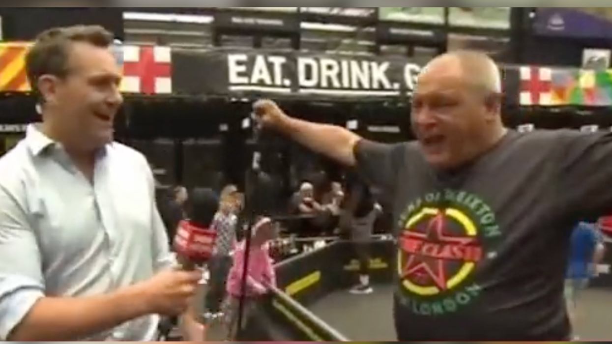 BBC presenter talking to football fan