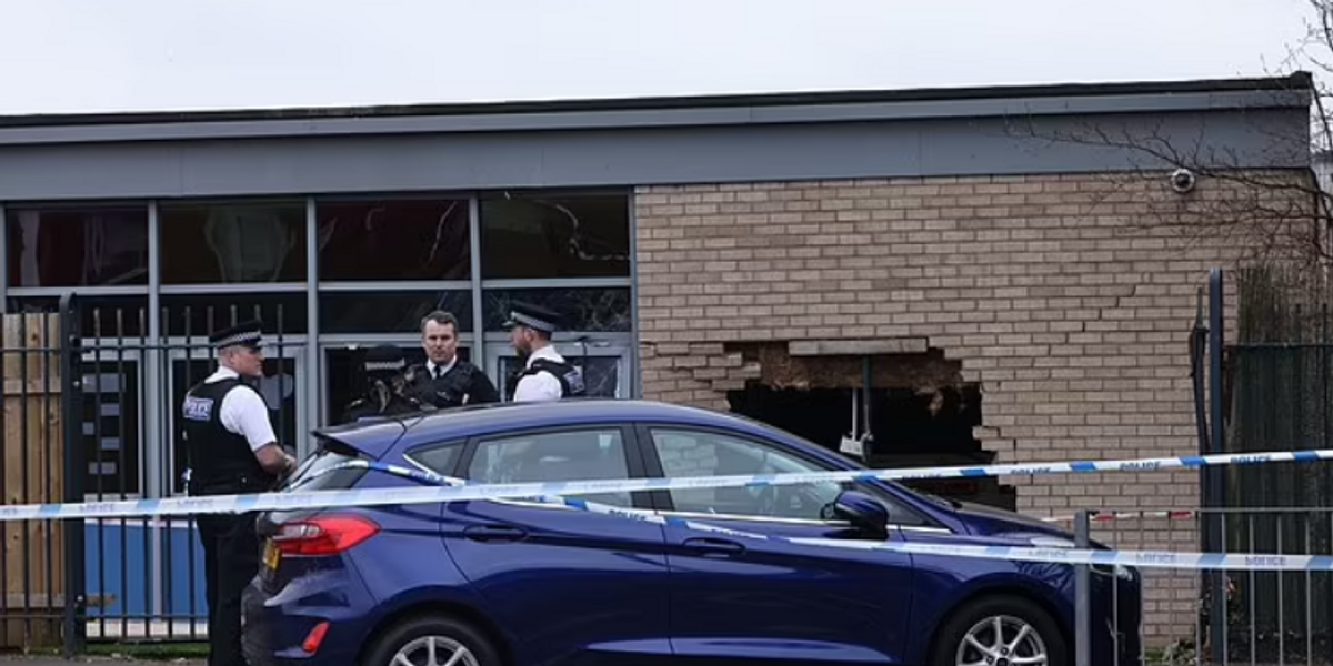 NextImg:Primary school evacuated after car PLOUGHS into it leaving behind huge gaping hole