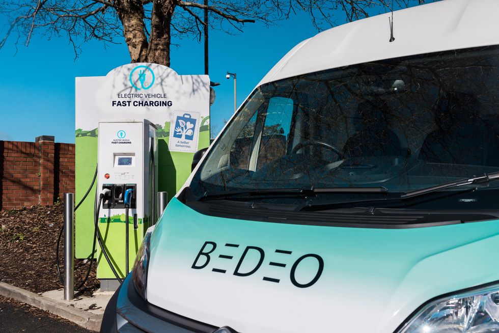 Bedeo van parked at an electric vehicle charging station