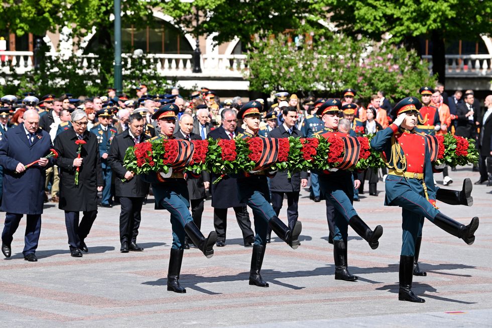Belarusian President Alexander Lukashenko, Kazakh President Kassym-Jomart Tokayev, Kyrgyz President Sadyr Japarov, Russian President Vladimir Putin, Tajik President Emomali Rakhmon, Turkmen President Serdar Berdymukhamedov and Uzbek President Shavkat Mirziyoyev take part in a flower-laying ceremony