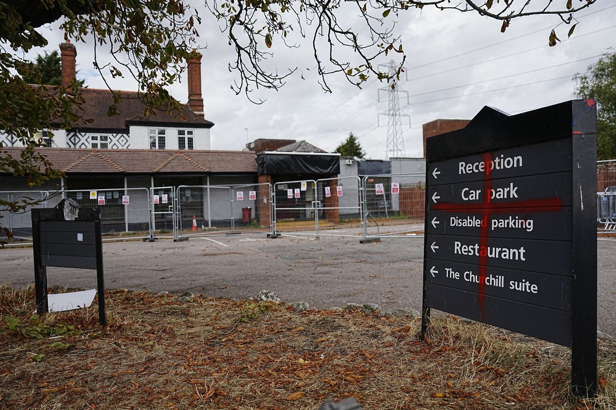 Bell Hotel, Epping sign vandalised with St George's cross