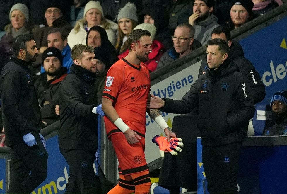 Championship game stopped as officials forced to act after sickening collision left player covered in blood