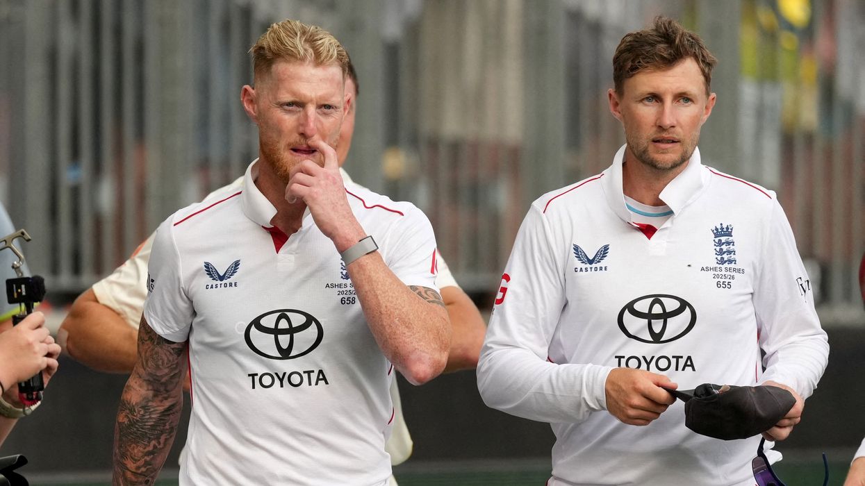 Ben Stokes and Joe Root look dejected after the match