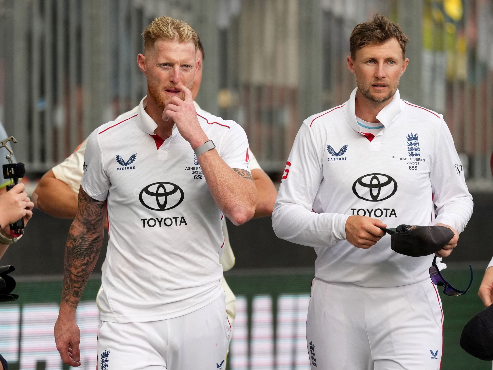 Ben Stokes and Joe Root look dejected after the match
