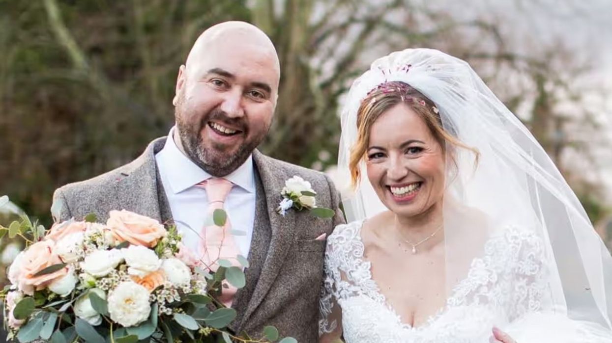 Ben Trotman pictured next to his wide on his wedding day