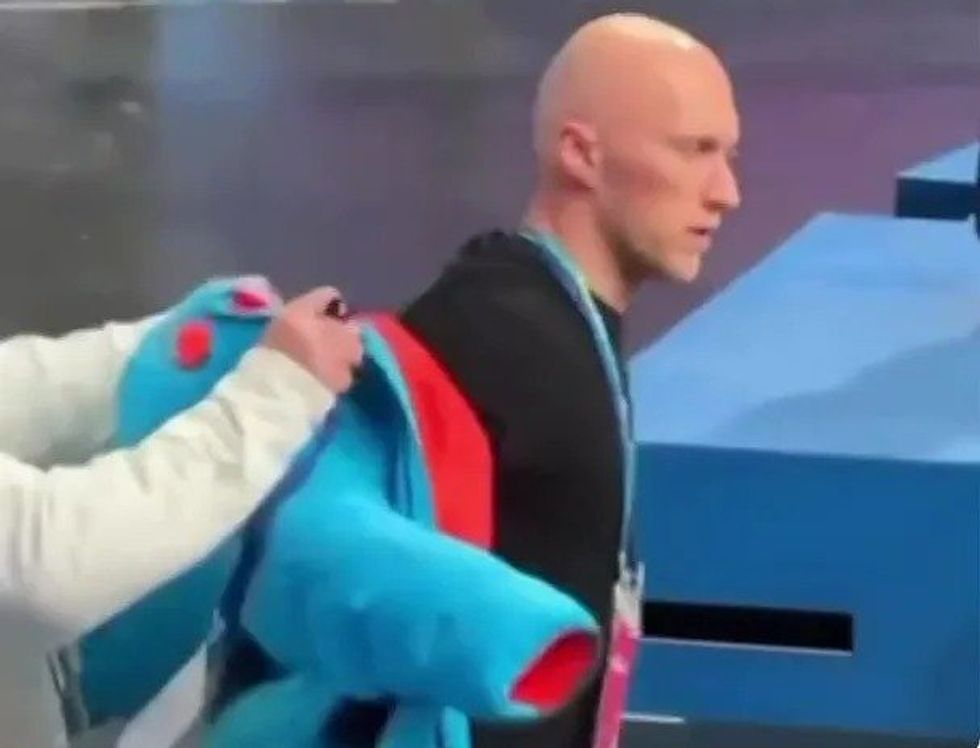 Benoit Richaud has become an unexpected sensation at the Milano-Cortina Winter Olympics, capturing social media attention with his rapid-fire wardrobe transformations