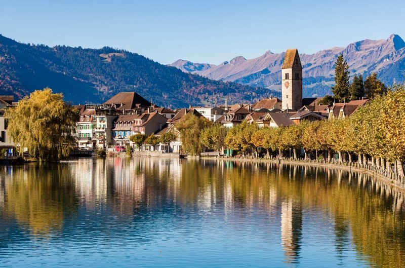 European Country With Lakes and Scenery Tops for British Expats