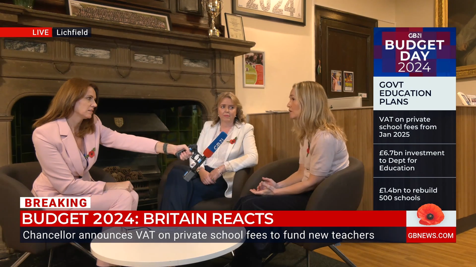 Bev Turner speaks to Amy at a school in Lichfield