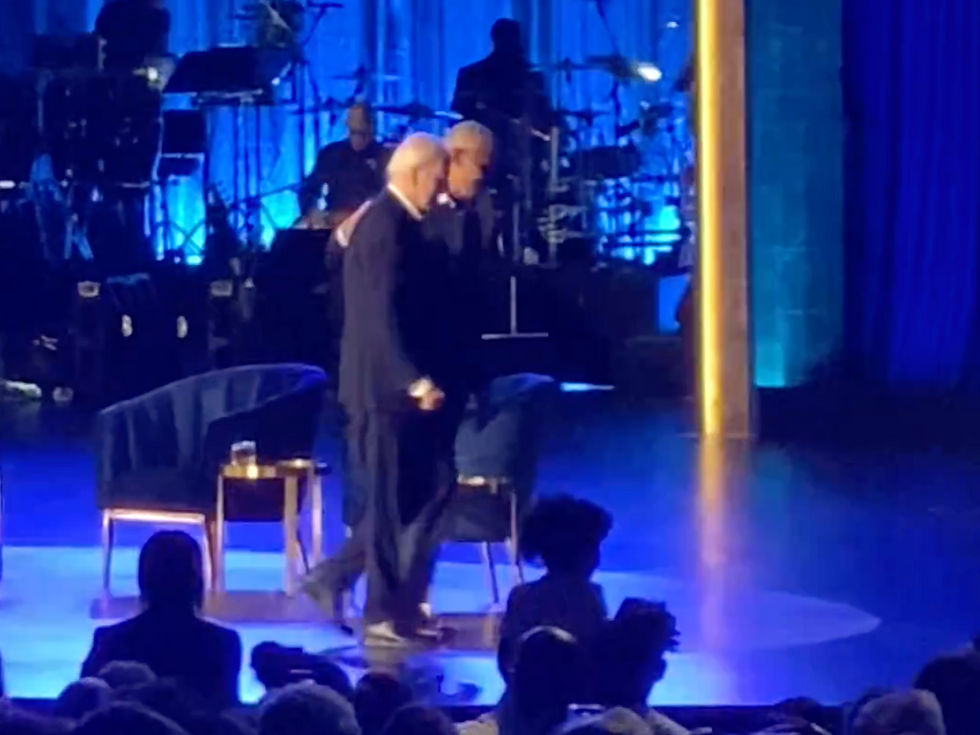 Biden and Obama walking off stage