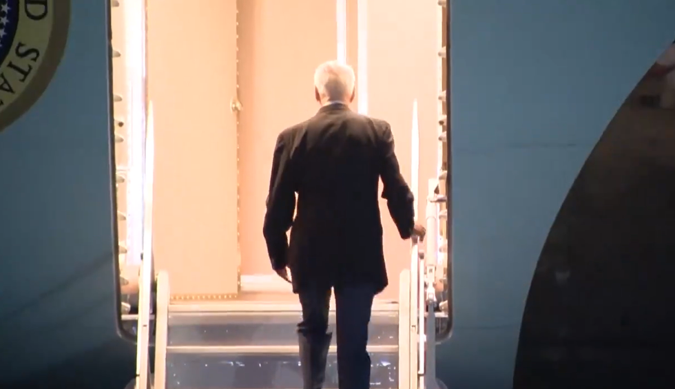 Biden boarding the plane