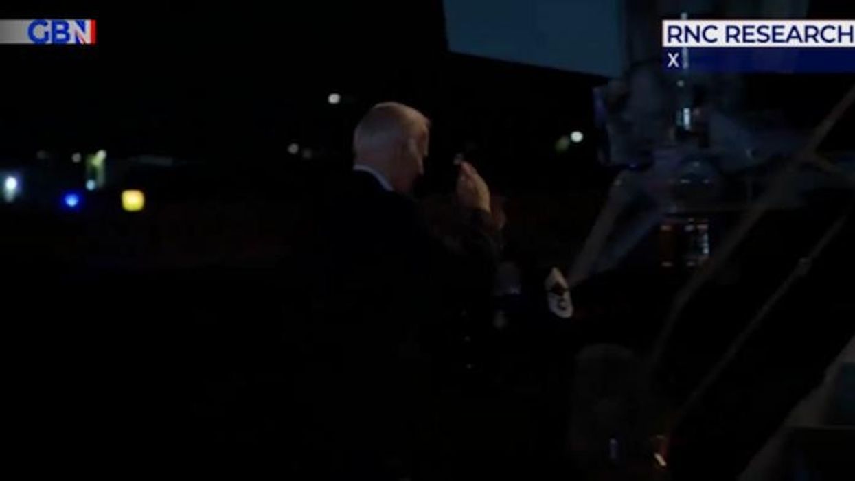 Joe Biden left looking 'unsteady and confused' as he struggles to mount steps of Air Force One