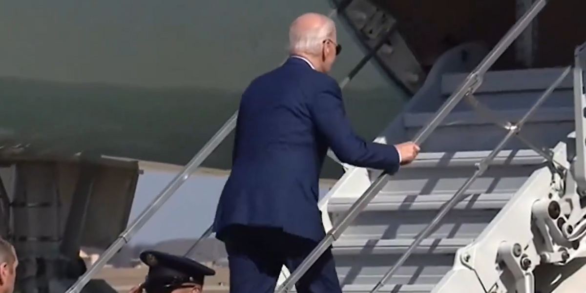 NextImg:Joe Biden stumbles TWICE while climbing onto Air Force One in fresh public blunder