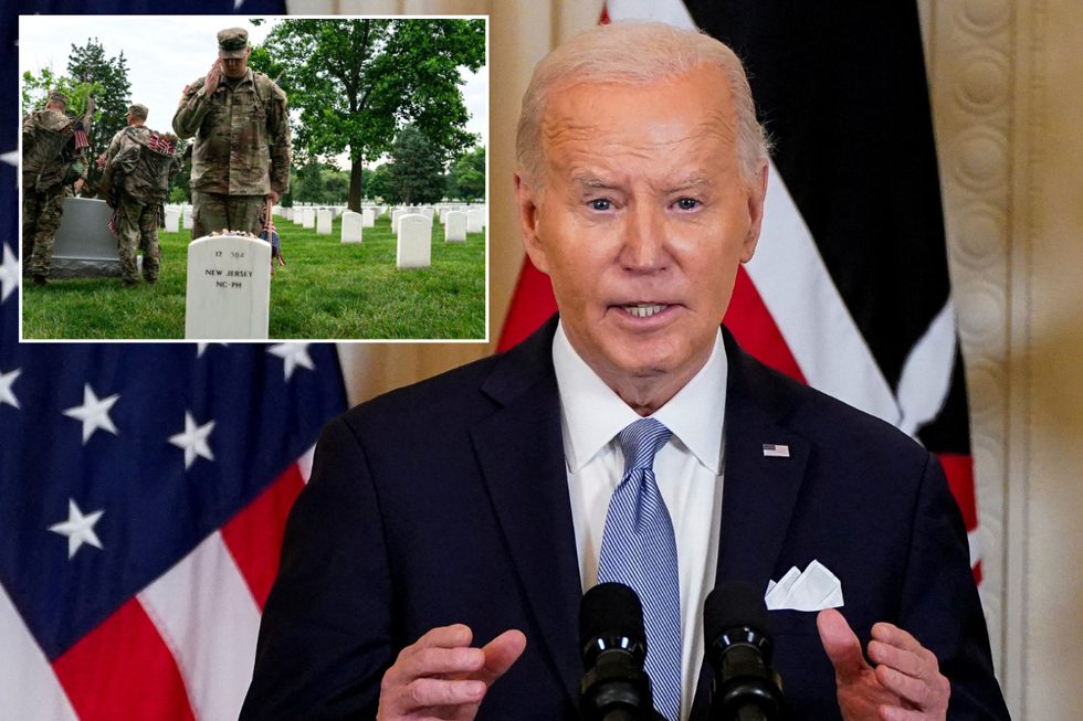 Biden, US army soldier saluting grave