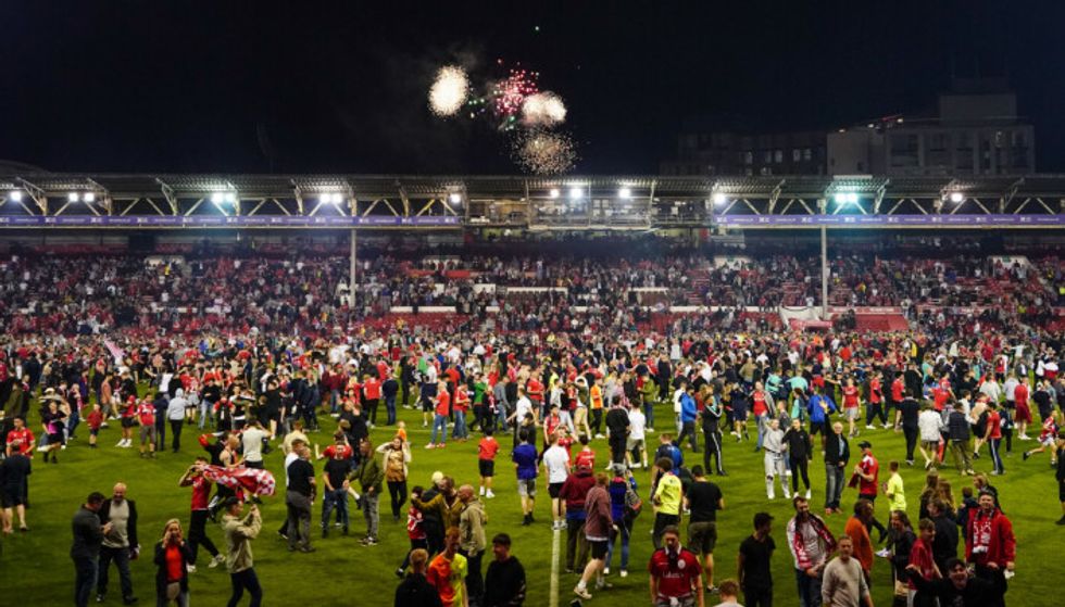 Billy Sharp was headbutted during a pitch invasion