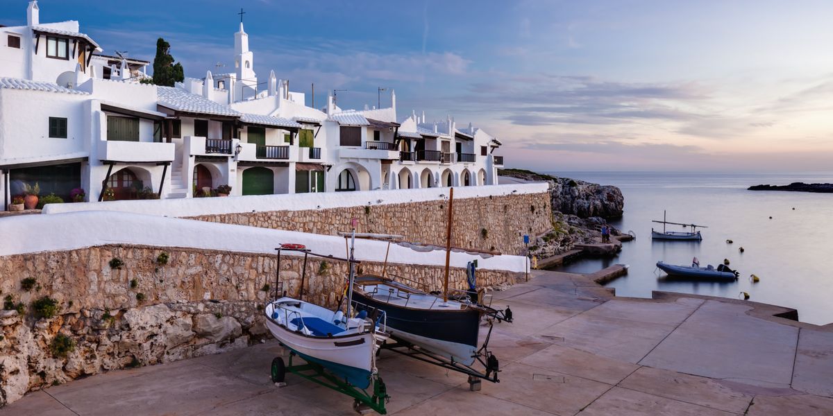 NextImg:Leafy Menorca village fights back as it REJECTS tourism ban in referendum