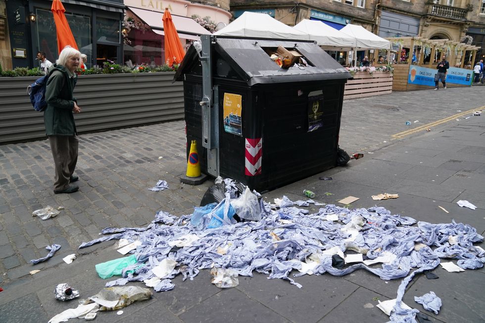Bins in Cockburn Street in Edinburgh. cleansing workers at the City of Edinburgh Council will begin eleven days of strike action. Picture date: Thursday August 18, 2022.