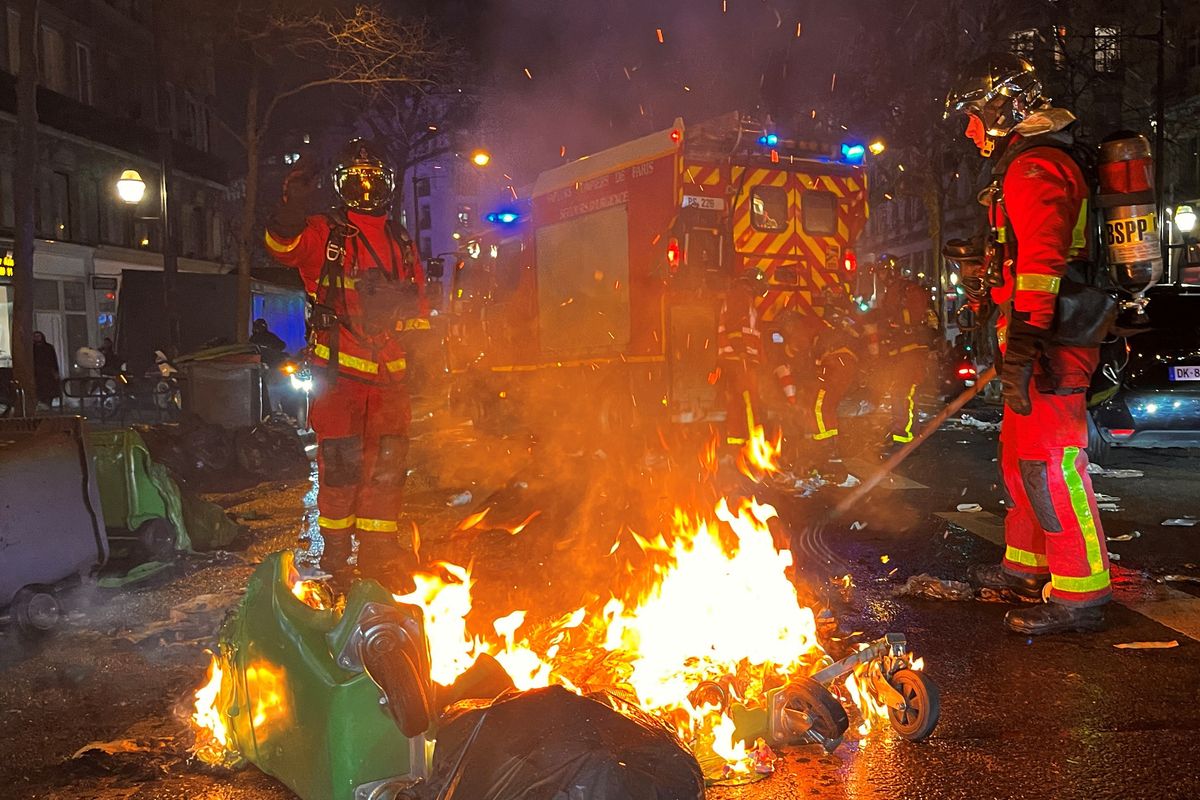 Bins set on fire in Paris following protests 