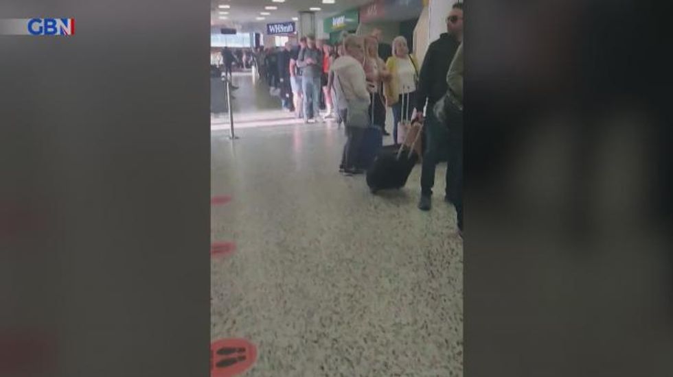 Birmingham Airport leaves thousands queuing outside for hours amid travel chaos