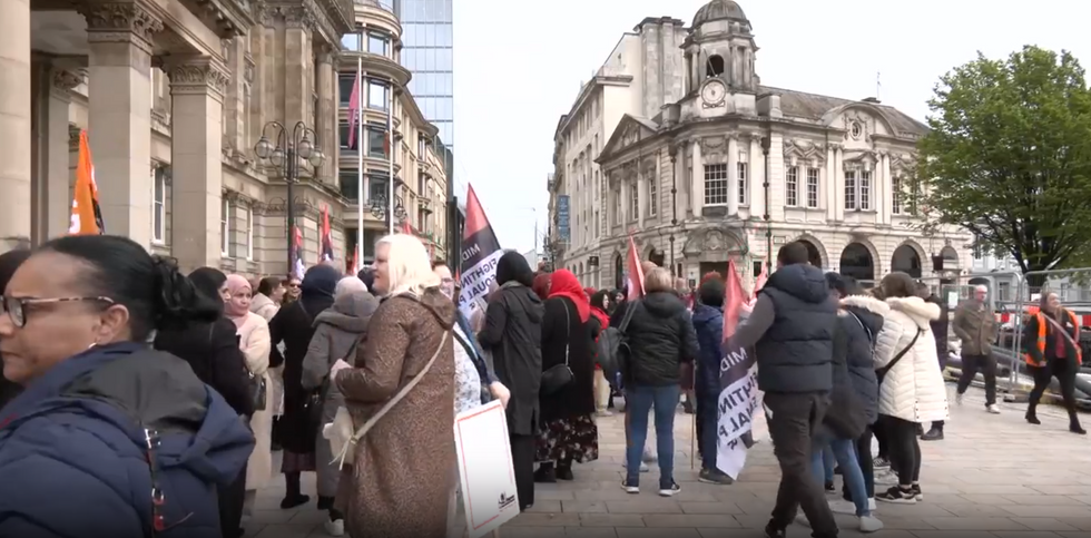 Birmingham school staff walk out