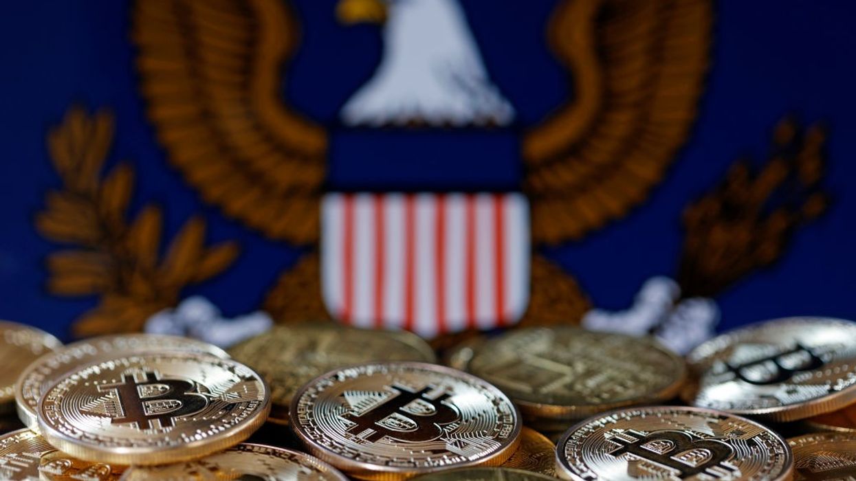 Bitcoin coins and SEC logo