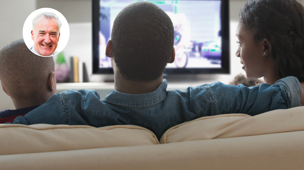 Black family watching TV